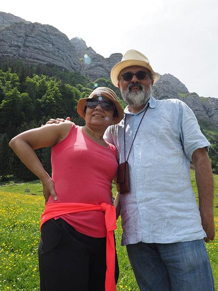 Faculty members posing together on a hike.