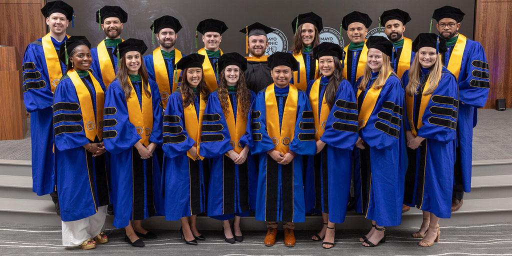 Group photo of graduates from Mayo Clinic Alix School of Medicine and Graduate School of Biomedical Sciences in Florida