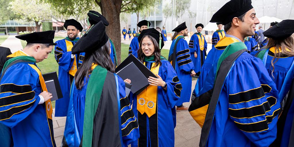 2024 Graduates gather outside after Commencement at Mayo Clinic in Arizona
