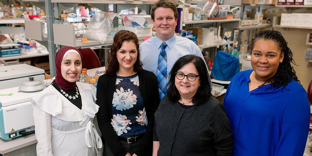 Group picture of the researchers in the lab of Lisa Schimmenti, M.D.
