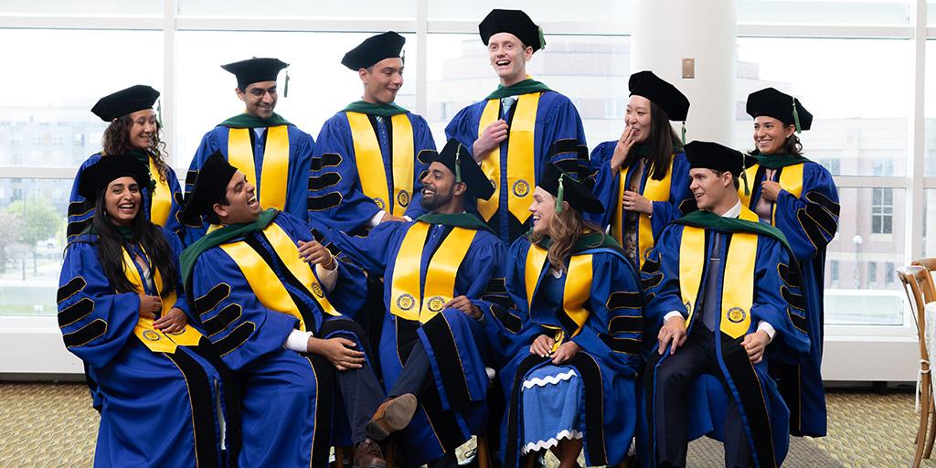 Group photo of 2026 medical school graduates at Commencement in Rochester, Minnesota.