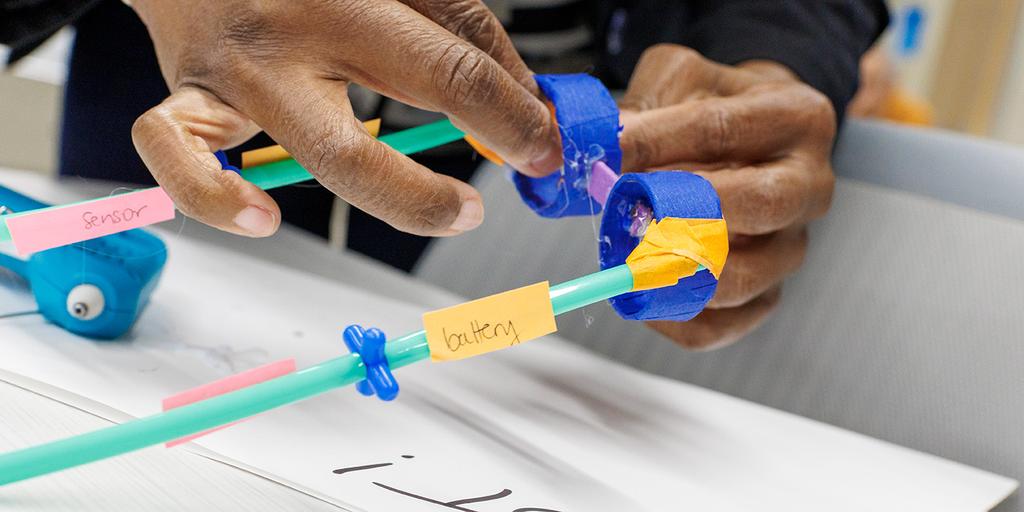 Participants work on medical innovations during the Biodesign Innovation Workshop.
