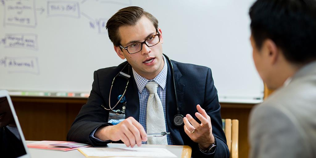 Internal medicine resident consults with a physician colleague at Mayo Clinic