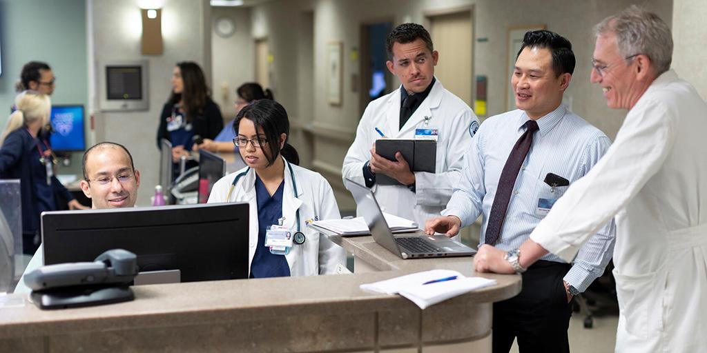 Internal medicine residents and faculty at Mayo Clinic in Arizona participate in grand rounds