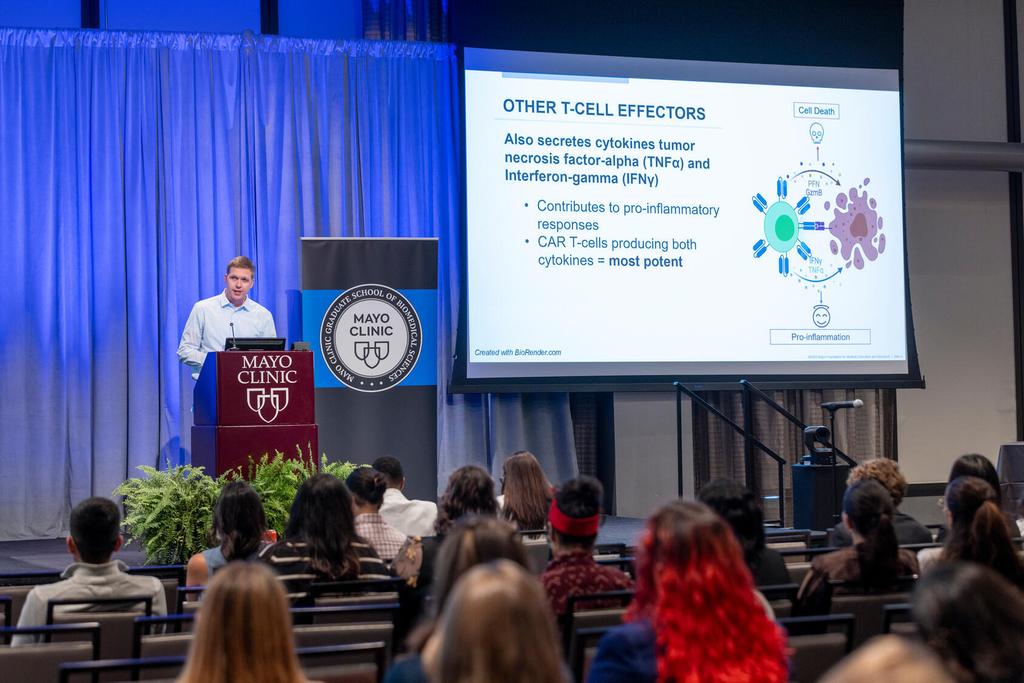 Matt Guttormson, Predoctoral student, speaks during the Mayo Clinic Graduate School of Biomedical Sciences (MCGSBS) Student Research Symposium.