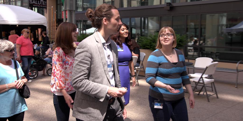 Mayo Clinic graduate students walk together down the street.