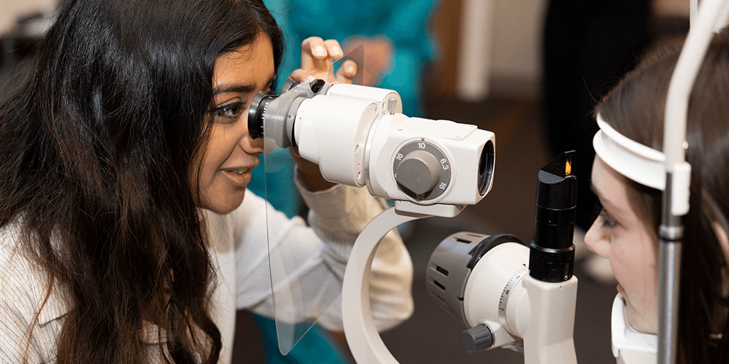 An orthoptist uses a synoptophore to assess a patient’s eye alignment and binocular vision.