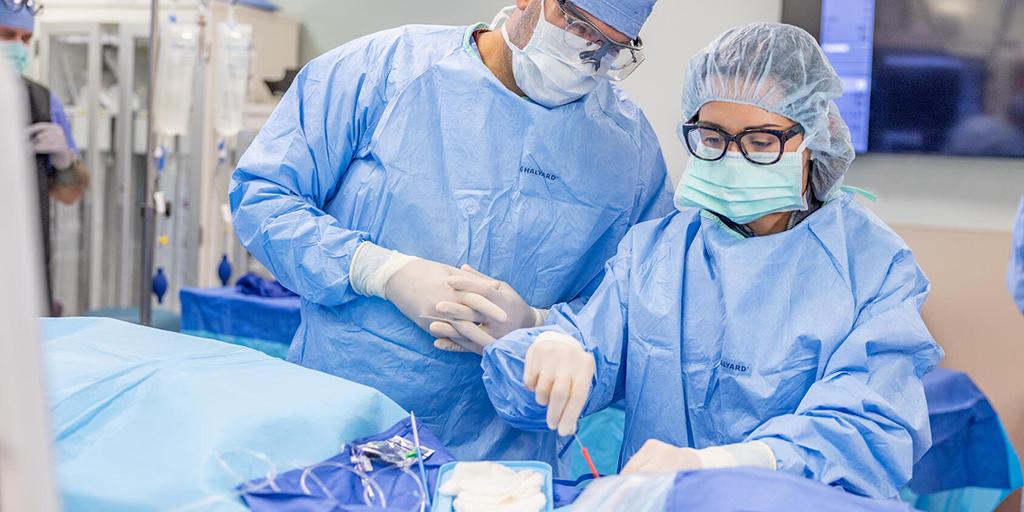 Interventional cardiologists performing a procedure in the catheterization (cath) lab. Asset requested by the Interventional Cardiology Fellowship