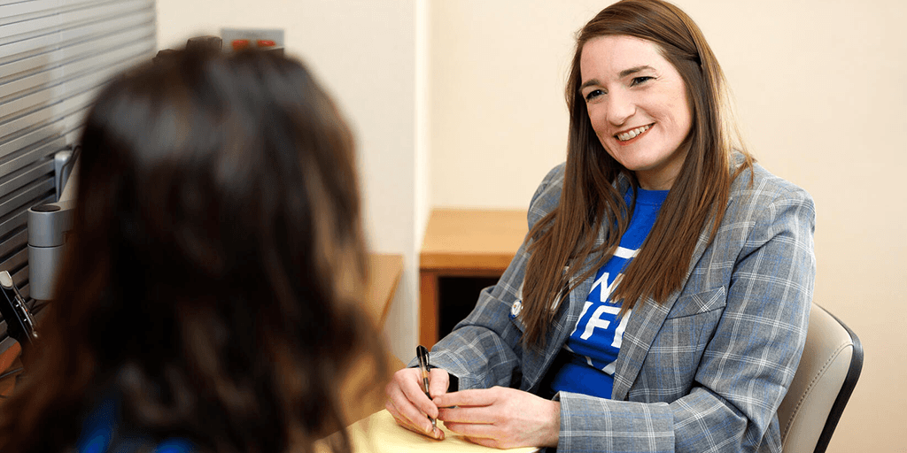 Social worker talking with transplant patient