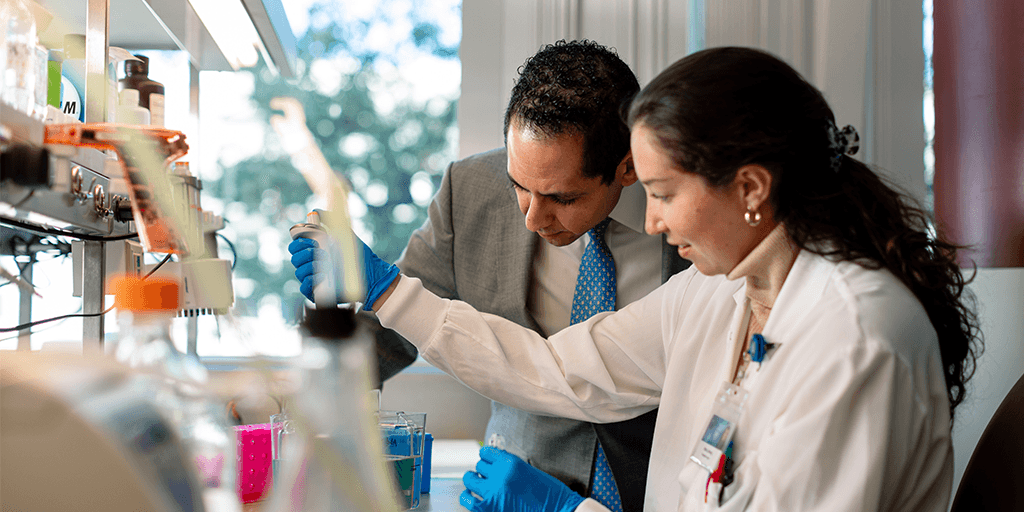 Infectious disease fellows working in the lab