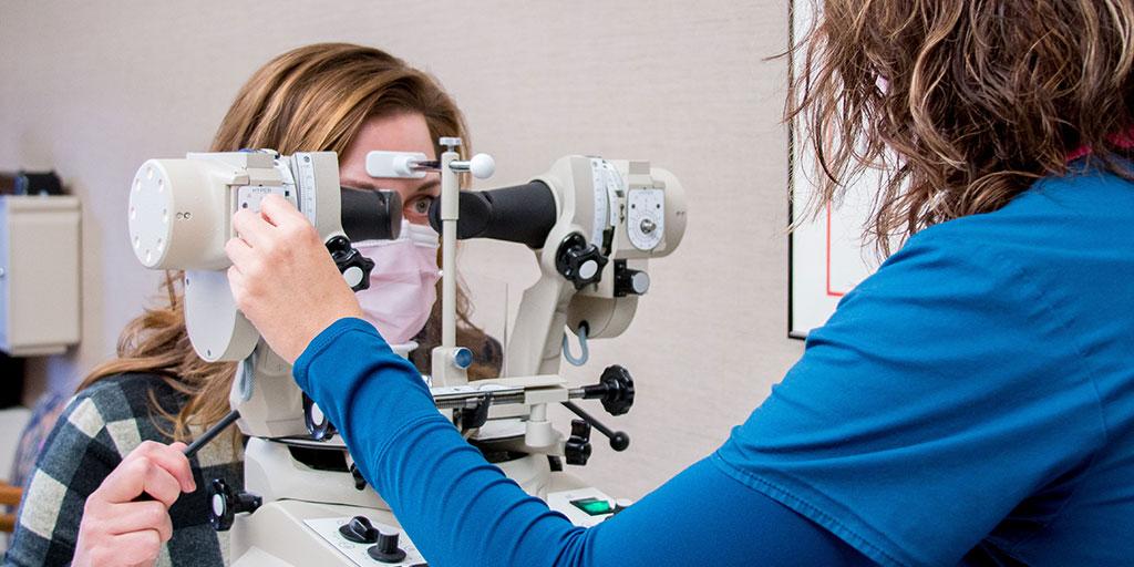 Orthoptic student performing eye exam during Orthoptic Program at Mayo Clinic in Rochester, MN