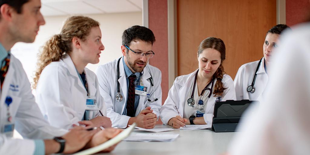 Pharmacy residents speak with one another at Mayo Clinic Health System in Eau Claire, WI.