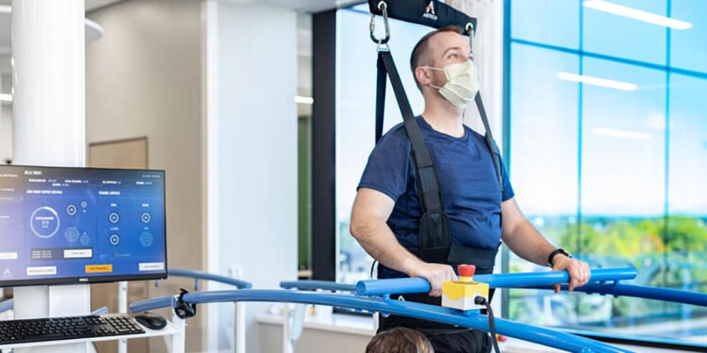 A patient is fitted into the equipment for physical therapy at a Mayo Clinic clinic