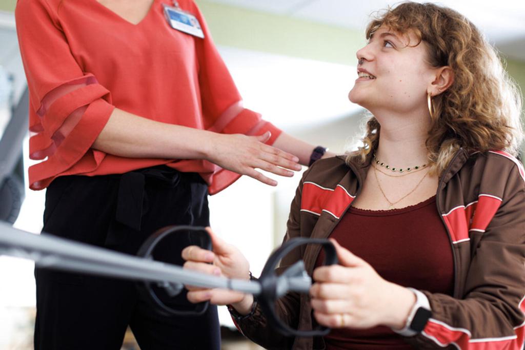 A doctor working with a patient.