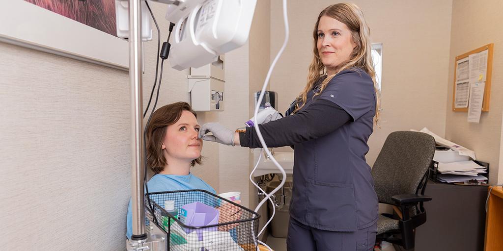 A speech pathologist at Mayo Clinic uses an endoscope during a swallowing procedure on a patient.