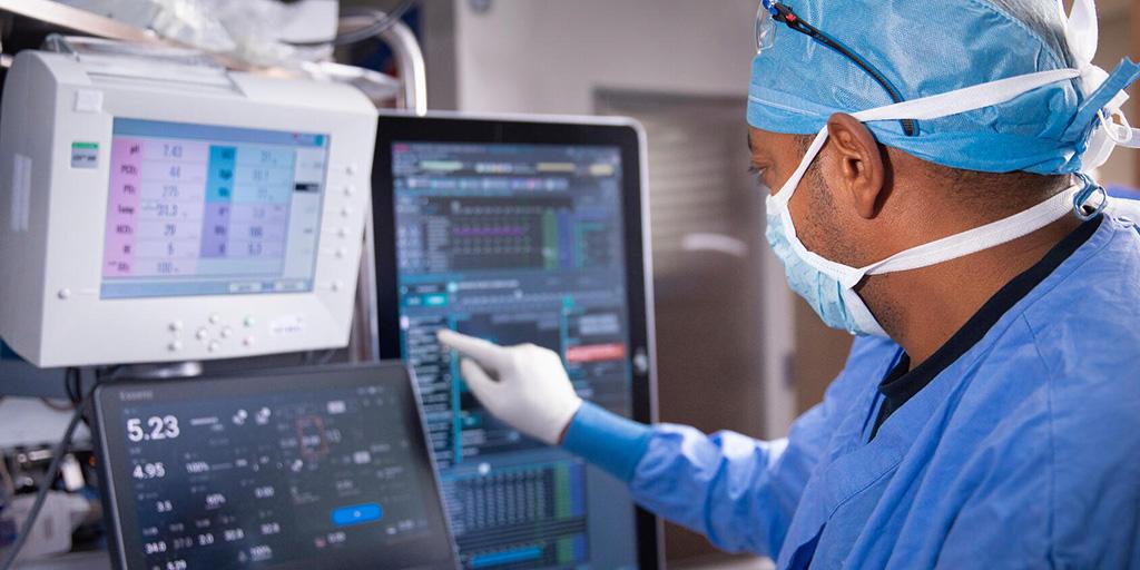 Cardiovascular perfusionist using extracorporeal circulation equipment in the OR at Mayo Clinic