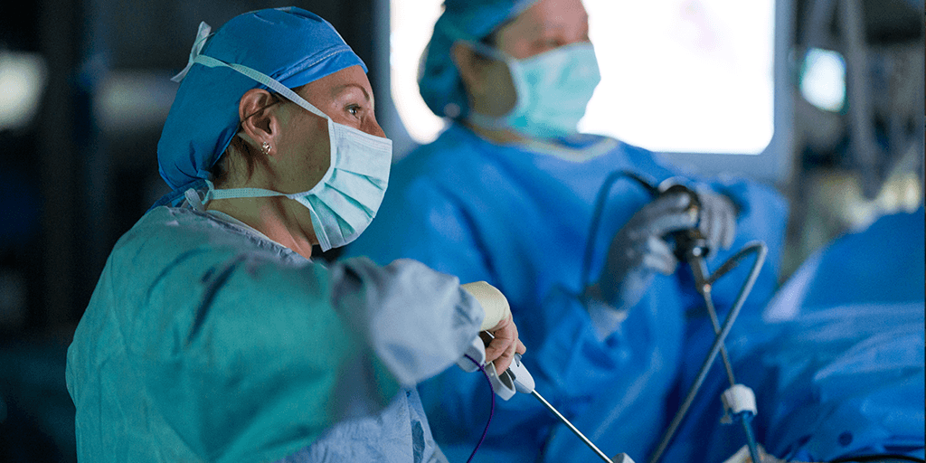 Surgeons performing laparoscopic procedure