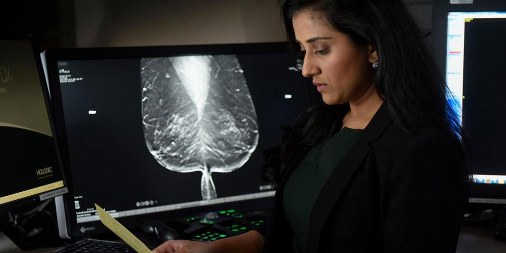 Breast imaging fellow looks at a scan at Mayo Clinic in Jacksonville, Florida.