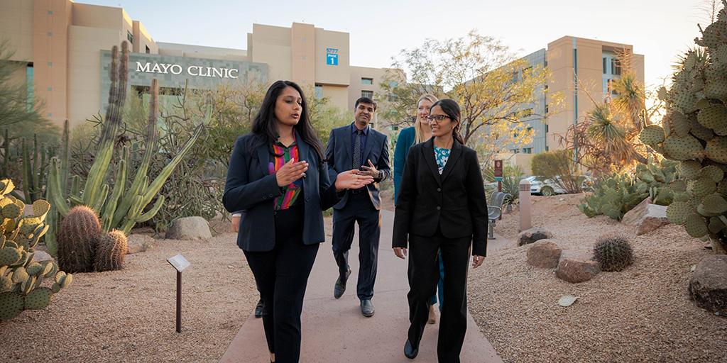 Fellows walk together outside at Mayo Clinic's campus in Arizona