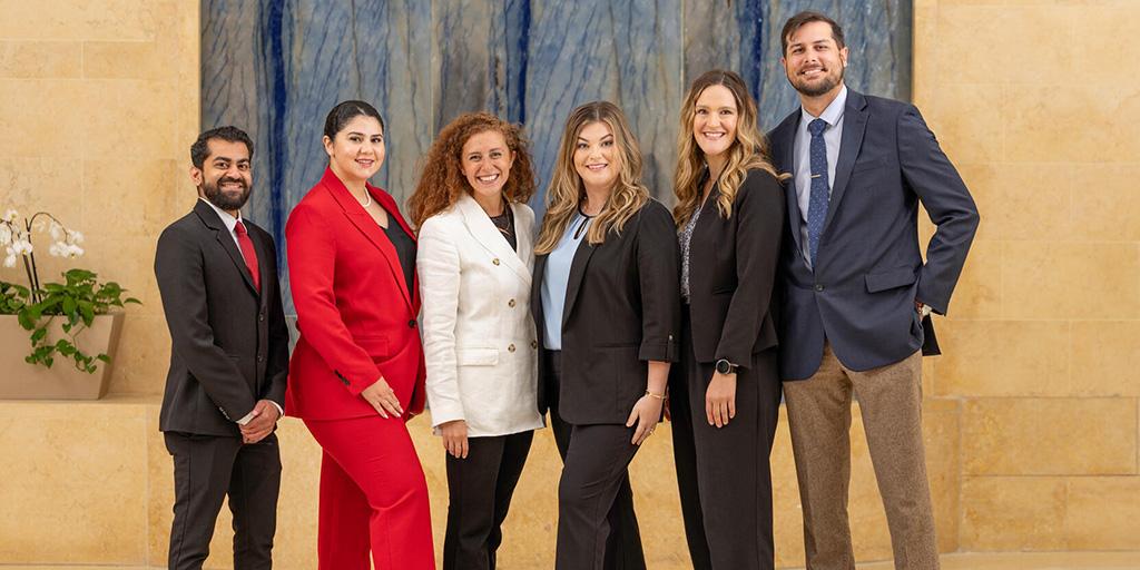 The graduates of the Family Medicine residency program pose together for a group photo.