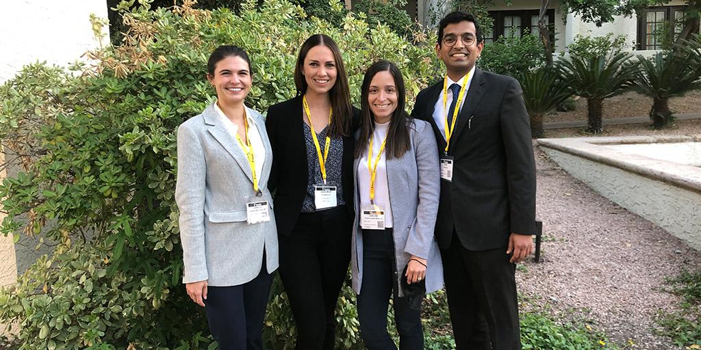 Female Pelvic Medicine and Reconstructive Surgery fellows pose together outside at the 2021 AUGS Annual Meeting.
