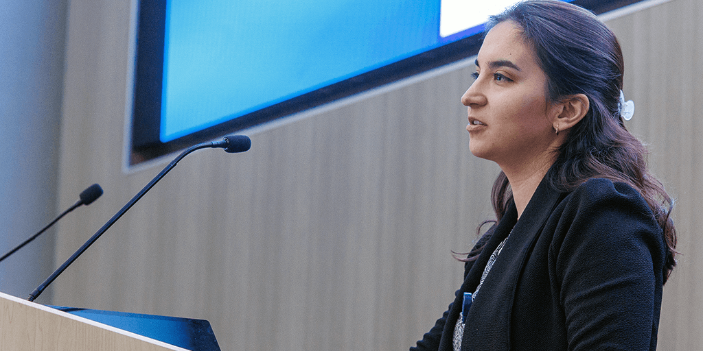 A presenter speaks at Academic Excellence Day