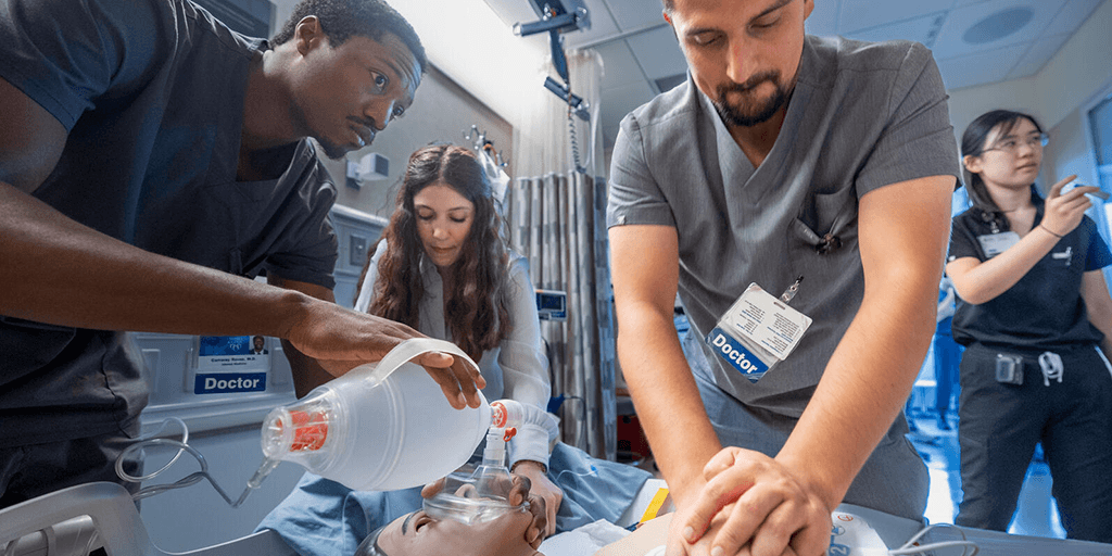 Internal Medicine Residents practicing CPR