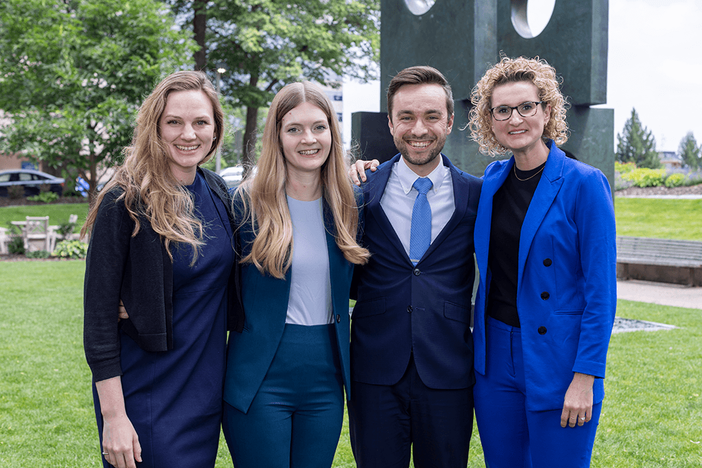 A formal portrait of four chief residents from the Internal Medicine Residency