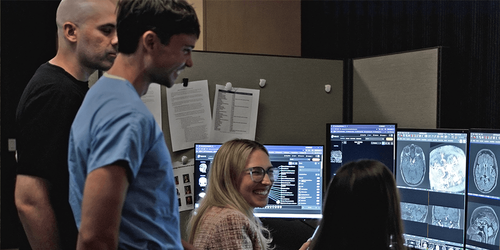 Neuroradiology fellows look at a scan