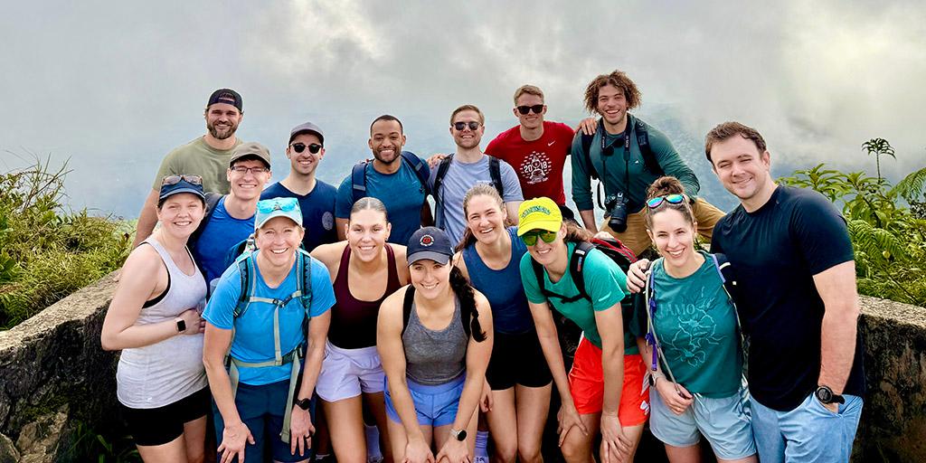 PMRR residents gather outside for a group photo during a group trip.