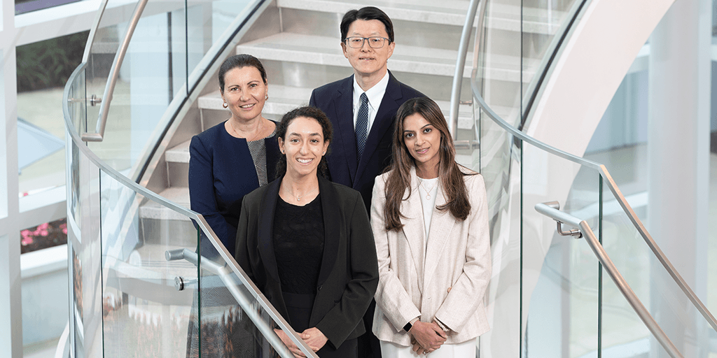 Group of Florida Rheumatology Fellowship fellows on stairs