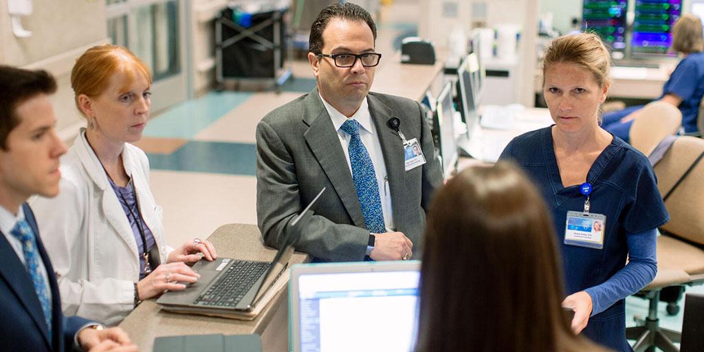 Transplant hepatology fellows and physicians make rounds in the hospital at Mayo Clinic in Arizona