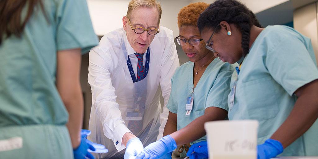 Alix School instructor talks to 3 Arizona students