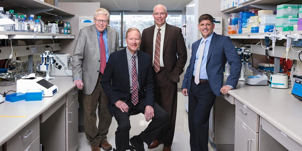 Physicians from the Mayo Clinic Graduate School of Biomedical Sciences (MCGSBS) expansion group gather for a photo.