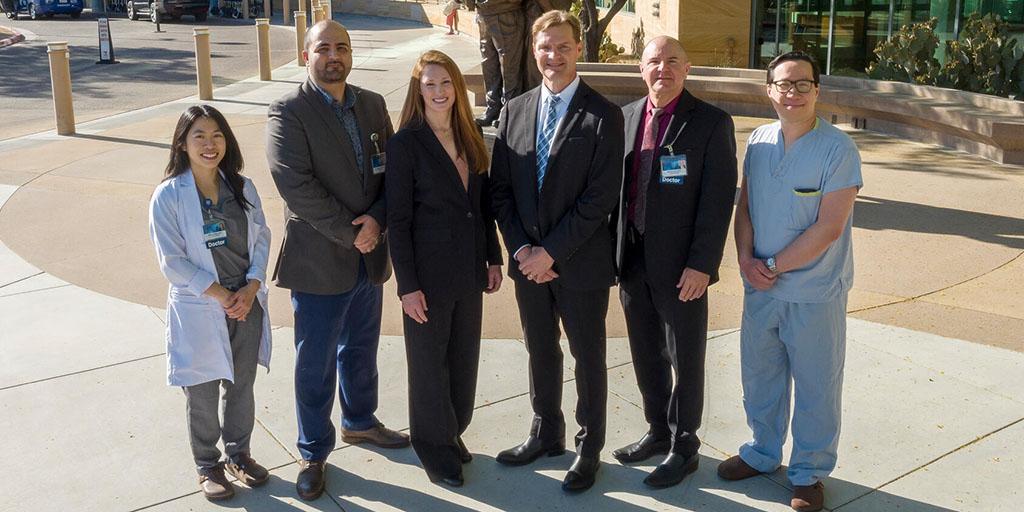 The two otorhinolaryngology (ENT) surgical teams who participated in the first larynx transplant at Mayo Clinic pose together for a photo.
