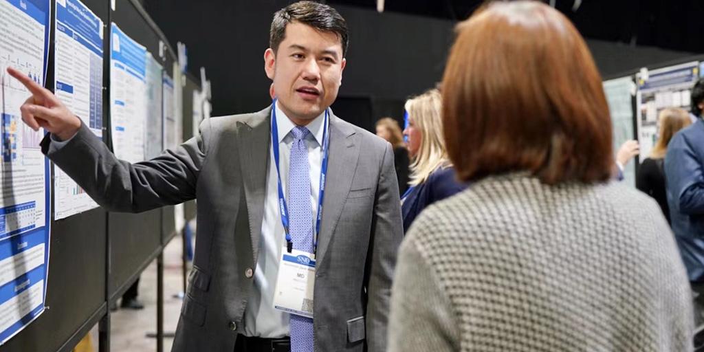 Zack Aibaidula presents his poster at Mayo Clinic Graduate School of Biomedical Sciences research symposium