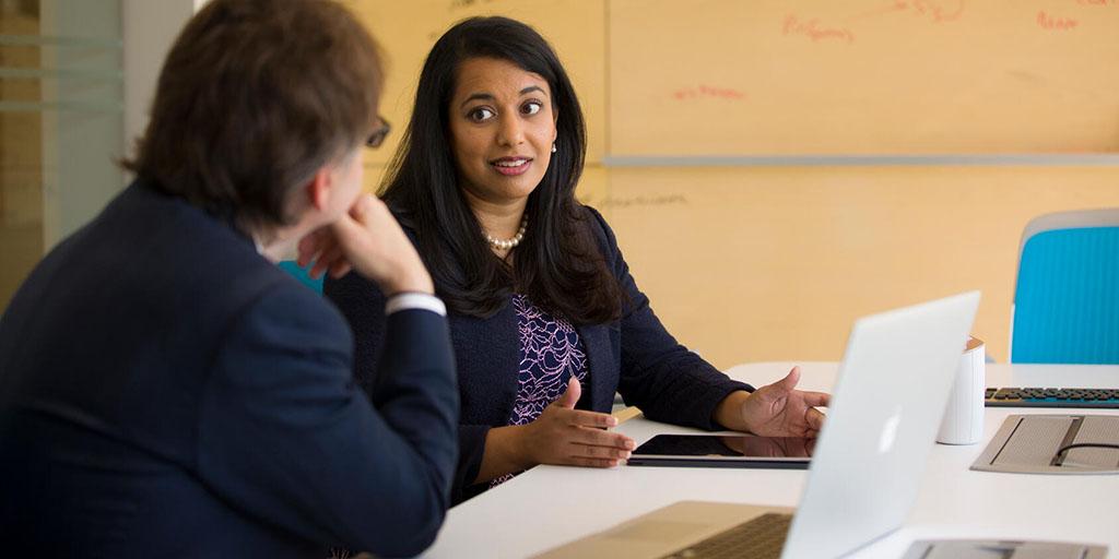 Amaal Starling, M.D., program director of the Transitional Year Residency in Arizona, speaks at a meeting