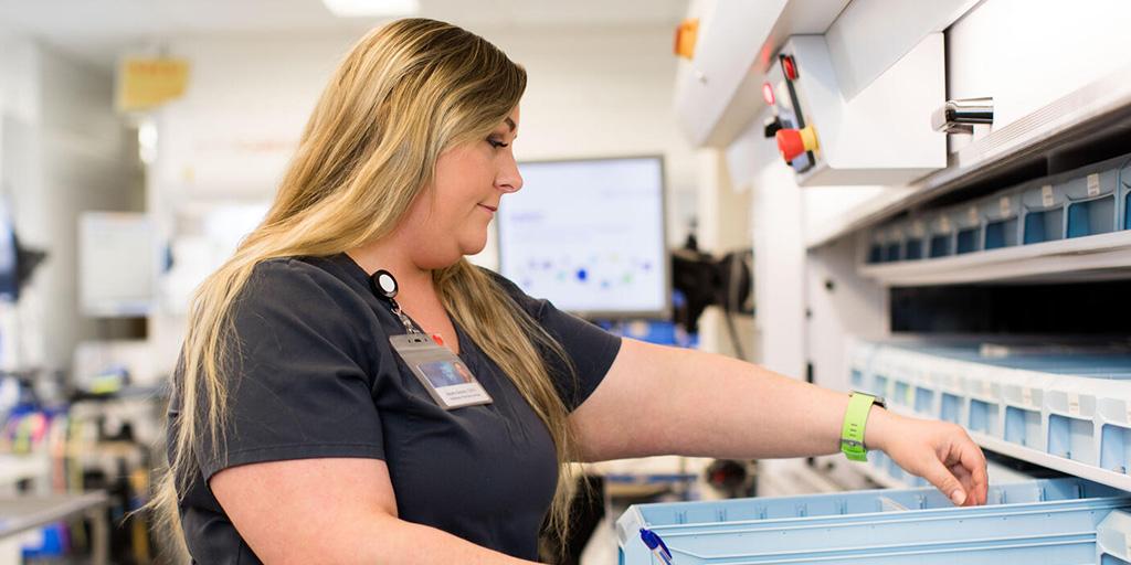 A Mayo Clinic pharmacy technician with medicine