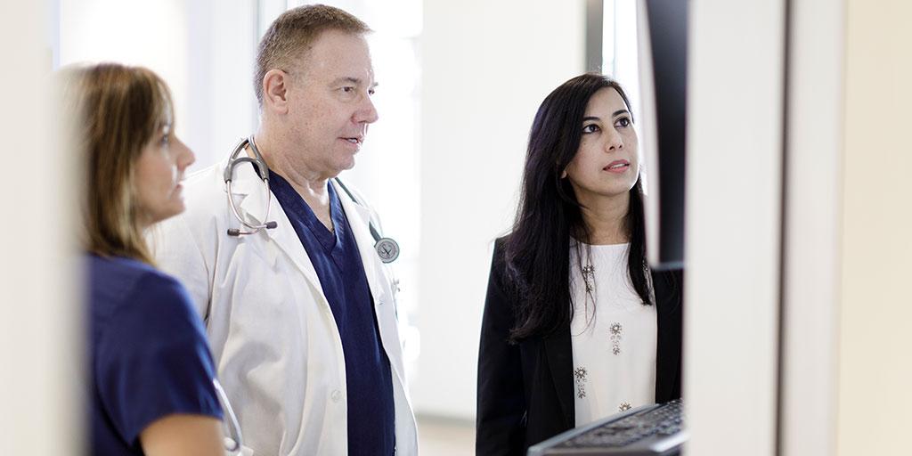 Nurse Practitioner or Physician Assistant Gastroenterology and Hepatology fellows speak with a faculty member at Mayo Clinic in Rochester, Minnesota.