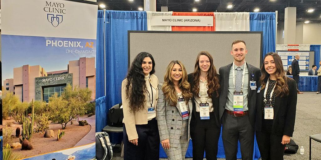 Arizona pharmacy residency represent Mayo Clinic at the 2022 ASHP conference.