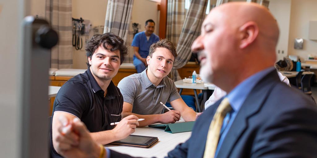 Students and faculty in the PA program learn in the classroom