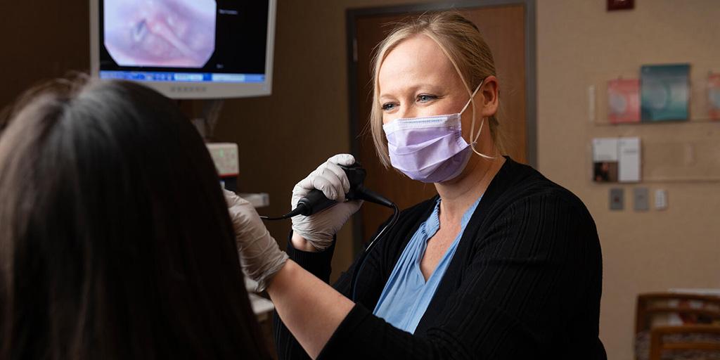 Speech language pathologist conducts a laryngoscopy at Mayo Clinic