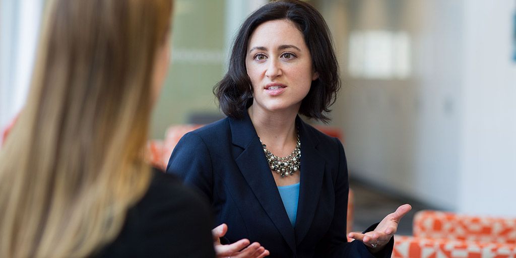 A Mayo Clinic social worker talking with a patient