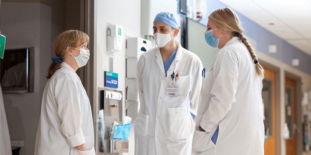 Abdominal transplant faculty and fellows collaborated in the hallway at Mayo Clinic in Rochester, Minnesota.