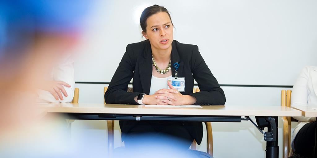 A Mayo Clinic anesthesiology fellow leaning in the classroom