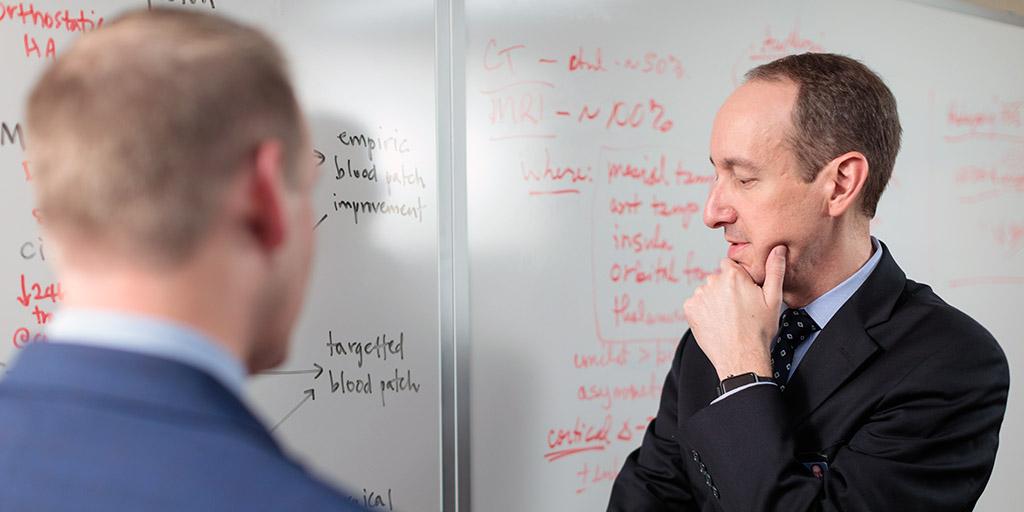 Mayo Clinic neurologists discussing a case