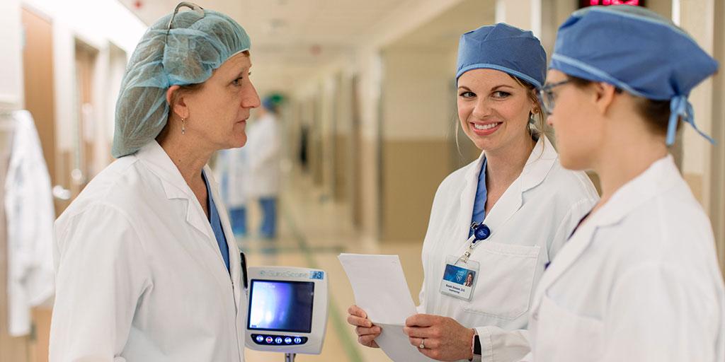 Anesthesiology residents talking in the hall.