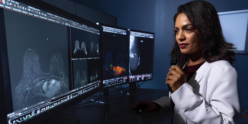 Shweta Srivastava, MBBS, Breast Imaging Resident, dictates while reviewing a scanned image on a screen.