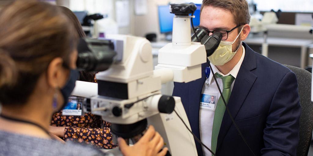 Cytopathology fellows using microscopes in the lab at Mayo Clinic in Rochester, Minnesota.
