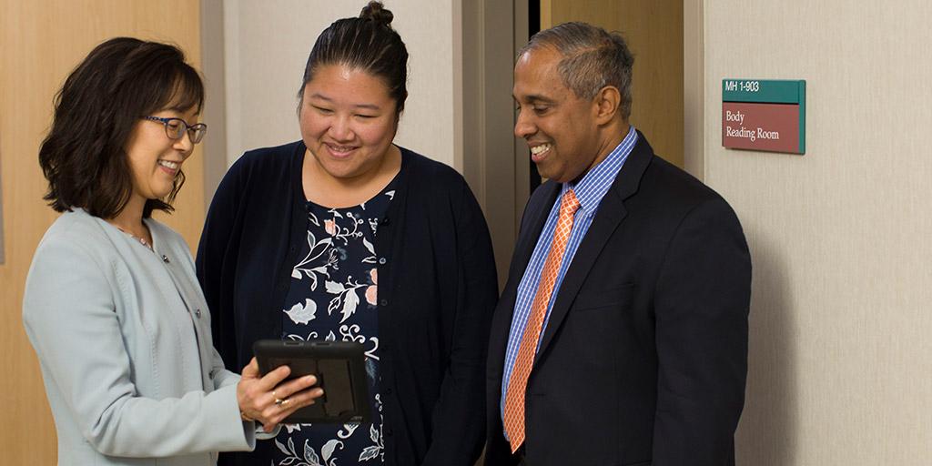 Faculty in the Diagnostic Radiology Residency chatting in the hall at Mayo Clinic in Phoenix, Arizona.